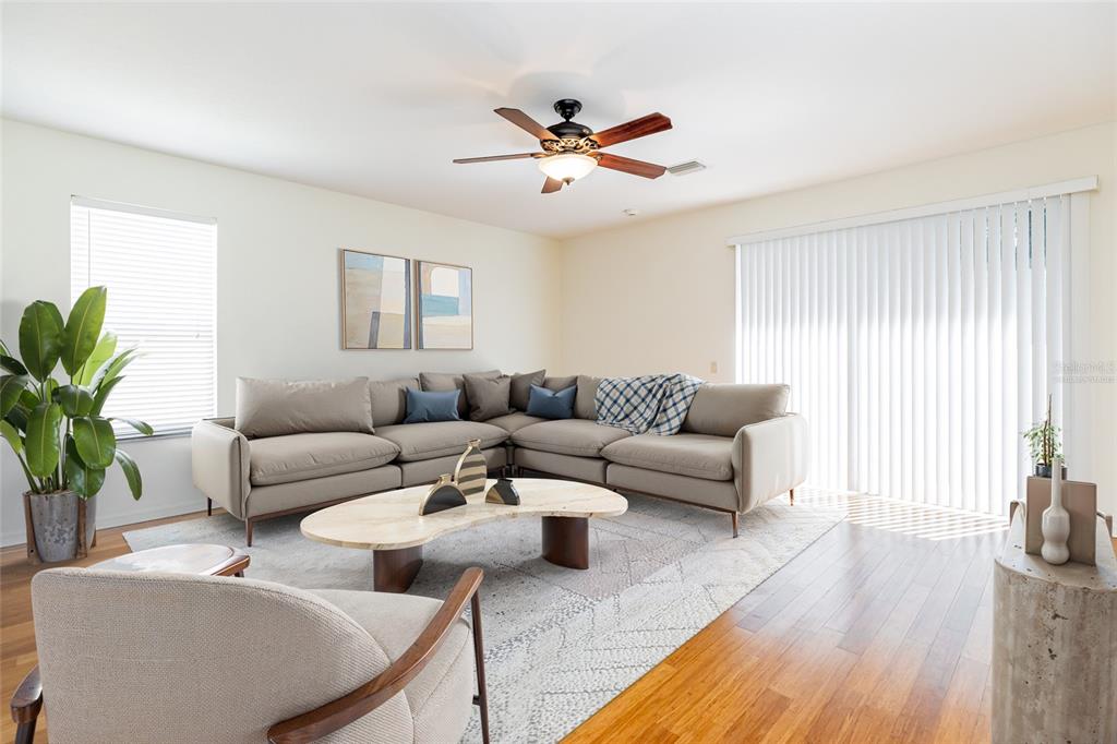 16299 Southwest 14th Avenue Road Ocala, FL 34473 - Photo 21 of 50 a living room with furniture and a large window
