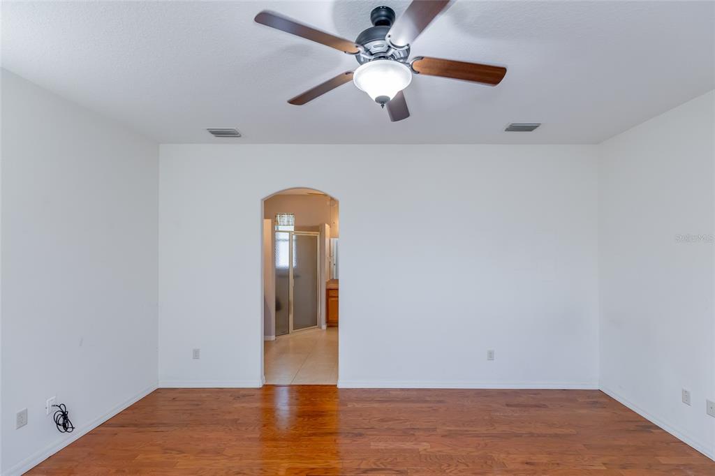 16299 Southwest 14th Avenue Road Ocala, FL 34473 - Photo 30 of 50 a view of empty room with wooden floor