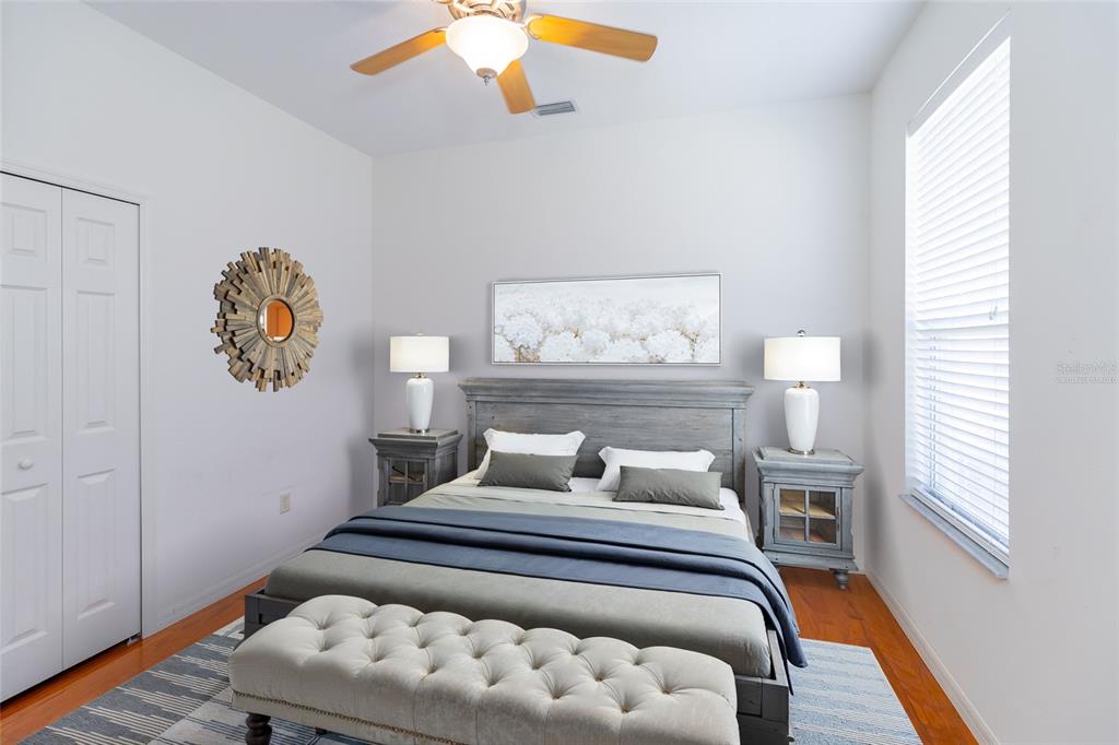 16299 Southwest 14th Avenue Road Ocala, FL 34473 - Photo 36 of 50 a bedroom with a bed and a window