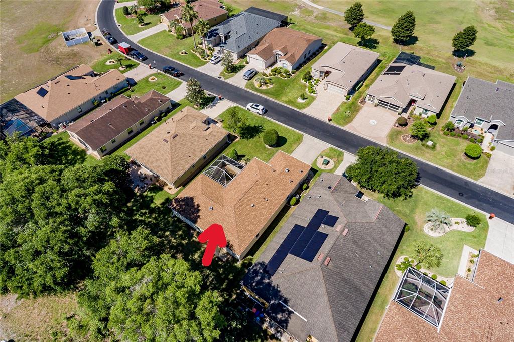 16299 Southwest 14th Avenue Road Ocala, FL 34473 - Photo 43 of 50 an aerial view of a house with a garden and plants