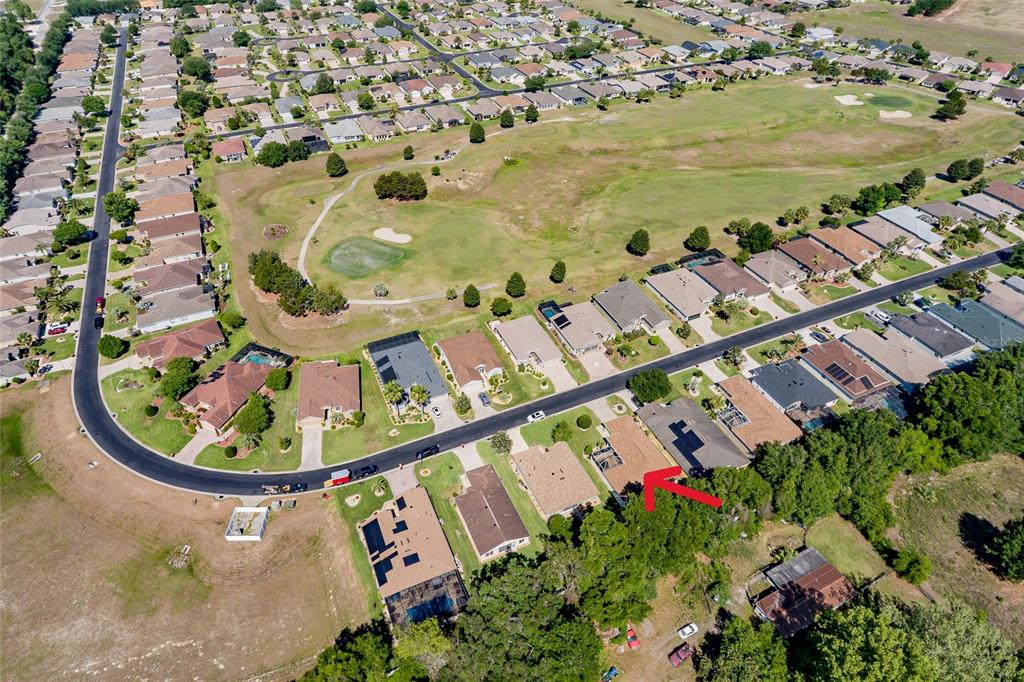 16299 Southwest 14th Avenue Road Ocala, FL 34473 - Photo 45 of 50 an aerial view of a house with a swimming pool