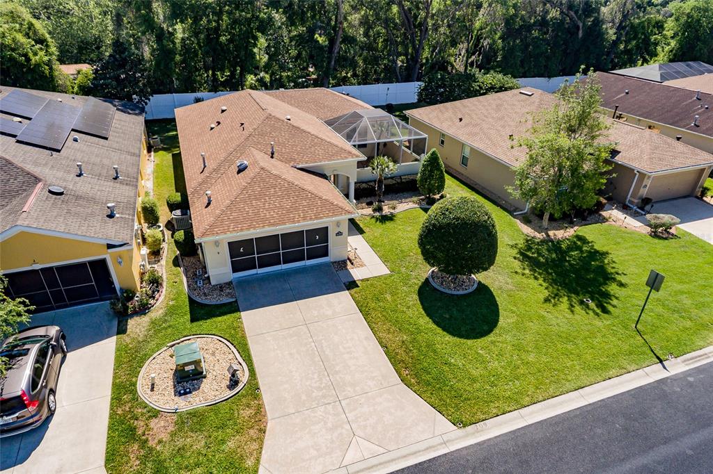 16299 Southwest 14th Avenue Road Ocala, FL 34473 - Photo 48 of 50 an aerial view of a house with garden space and street view