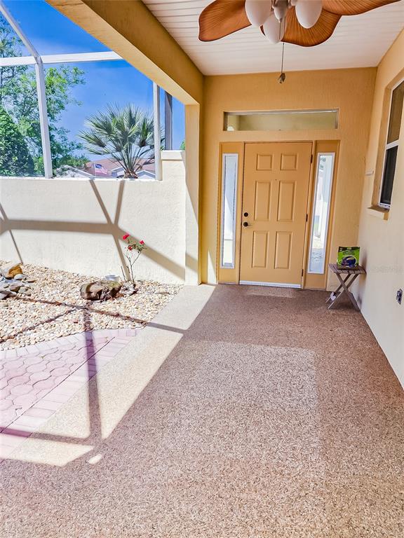 16299 Southwest 14th Avenue Road Ocala, FL 34473 - Photo 8 of 50 a view of an entryway with table and chair