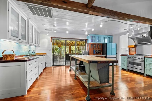 a view of outdoor space with garden and trees