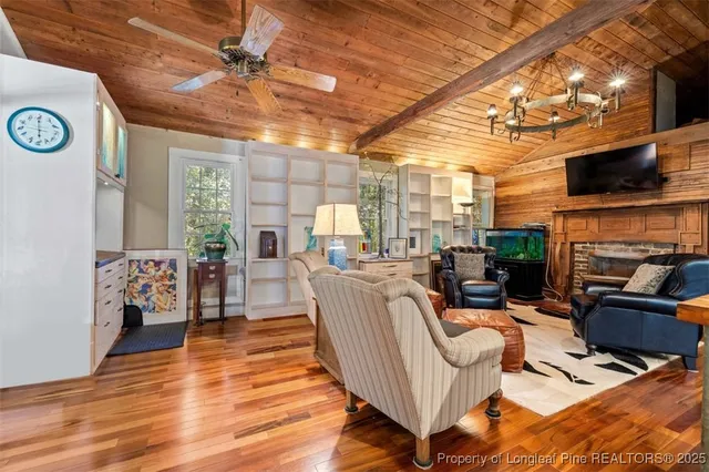 a view of yard with green space and seating area