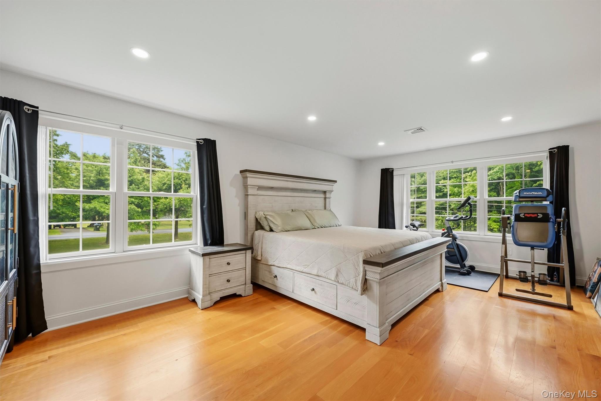 8 Darmstadter Road Bloomingburg, NY 12721 - Photo 22 of 47 15x19 Primary Bedroom with recessed lighting, wide oak flooring and balcony access.
