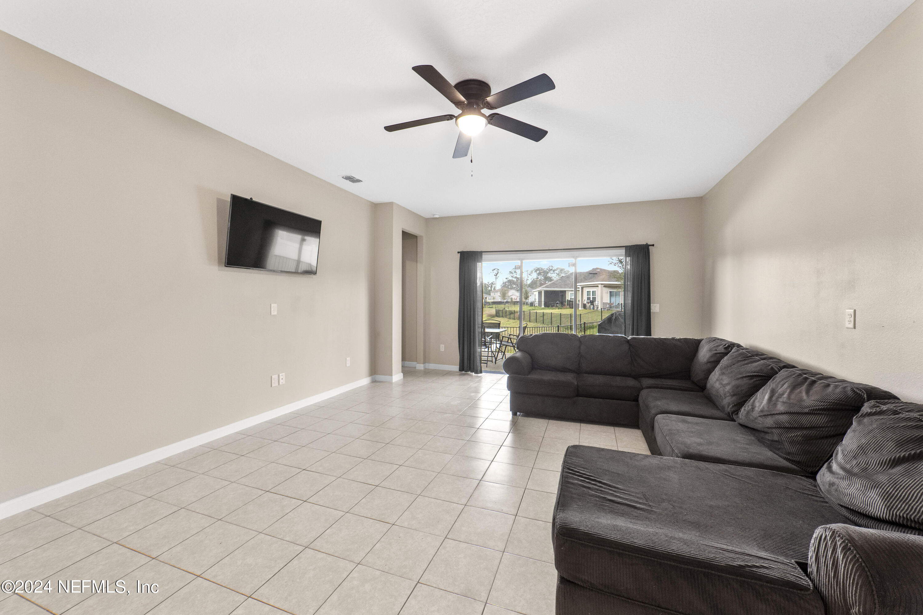 5334 Kellar Circle Jacksonville, FL 32218 - Photo 11 of 23 a living room with furniture and a window