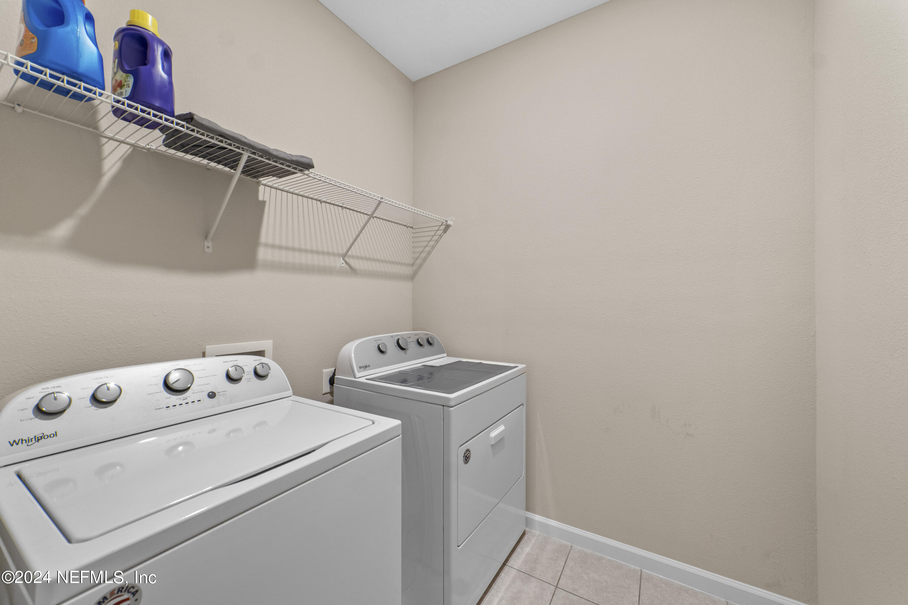 5334 Kellar Circle Jacksonville, FL 32218 - Photo 13 of 23 a utility room with dryer and washer