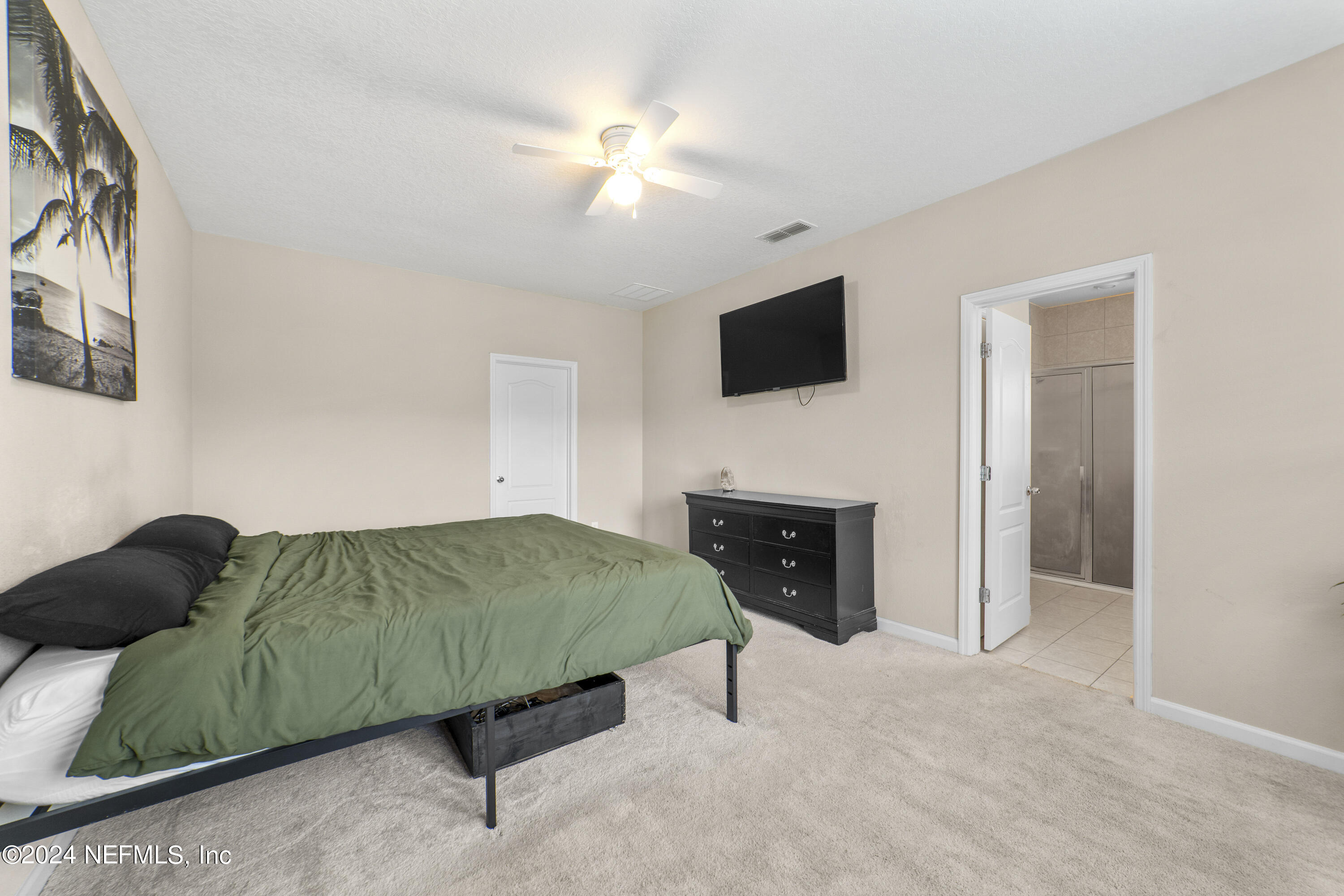 5334 Kellar Circle Jacksonville, FL 32218 - Photo 14 of 23 a living room with fireplace furniture and a flat screen tv