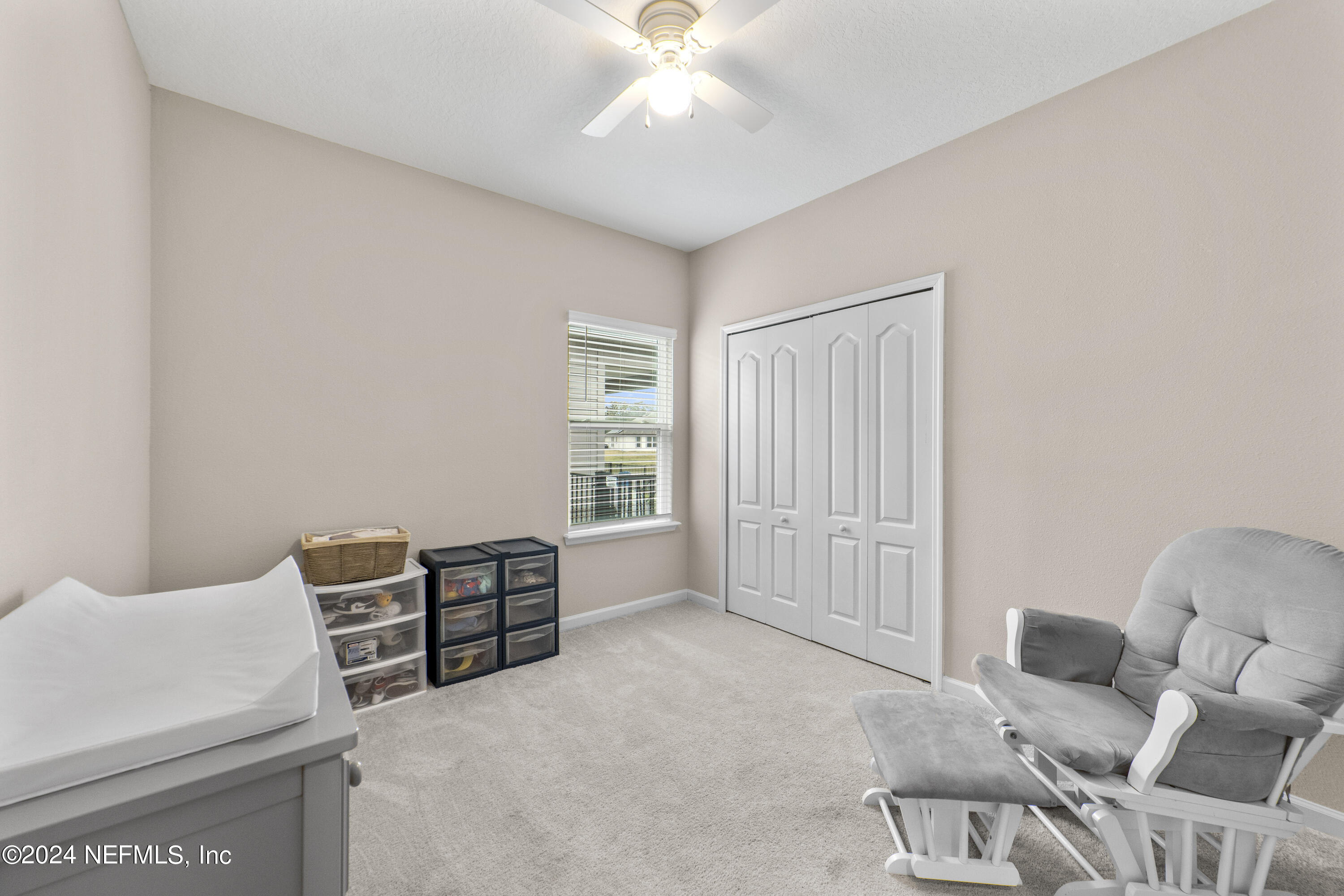 5334 Kellar Circle Jacksonville, FL 32218 - Photo 20 of 23 a living room with furniture and a ceiling fan