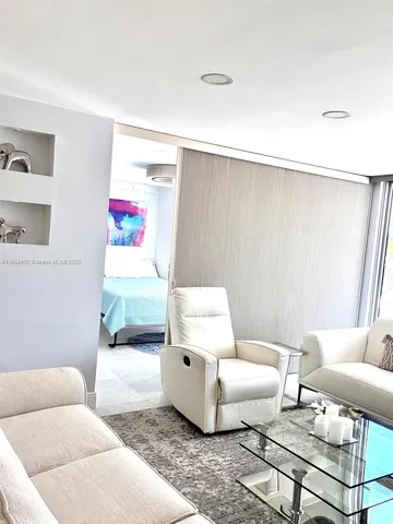 a living room with furniture and a couch