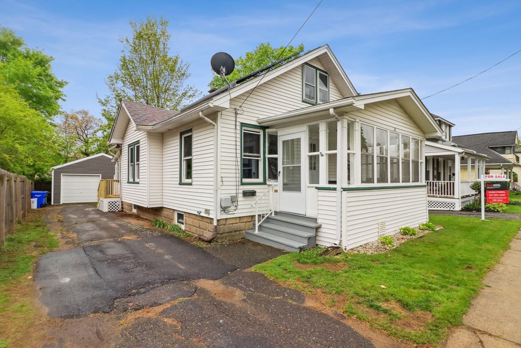 33 Crest Street Springfield, MA 01109 - Photo 23 of 28 a front view of a house with a yard