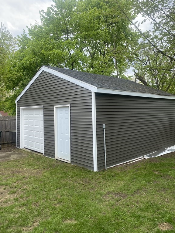 33 Crest Street Springfield, MA 01109 - Photo 24 of 28 a front view of house with yard and green space