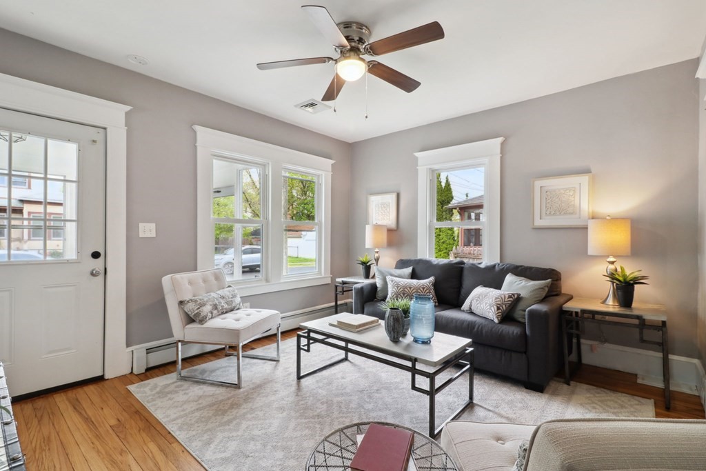 33 Crest Street Springfield, MA 01109 - Photo 4 of 28 a living room with furniture and wooden floor