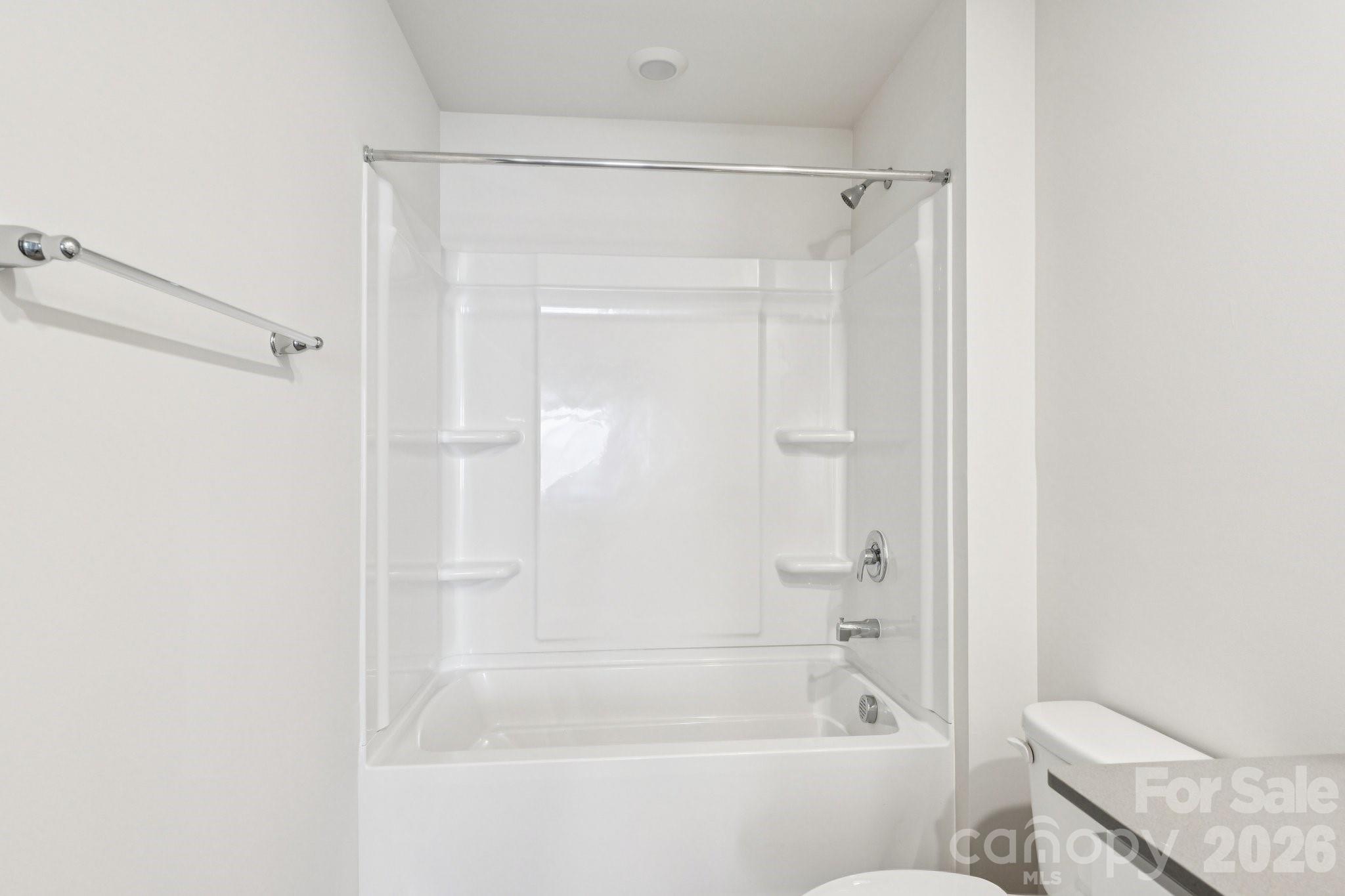 1430 Mammoth Road Hickory, NC 28602 - Photo 30 of 42 a bathroom with a shower a toilet and a bathtub