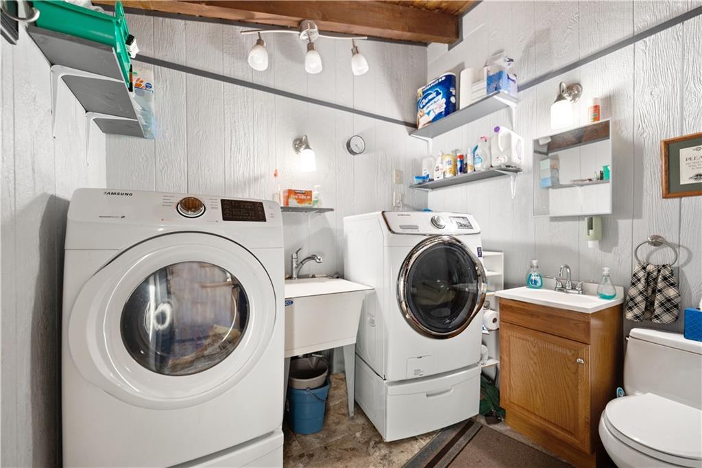 67 Spruce Peak Road Acme, PA 15610 - Photo 15 of 38 a utility room with sink dryer and washer