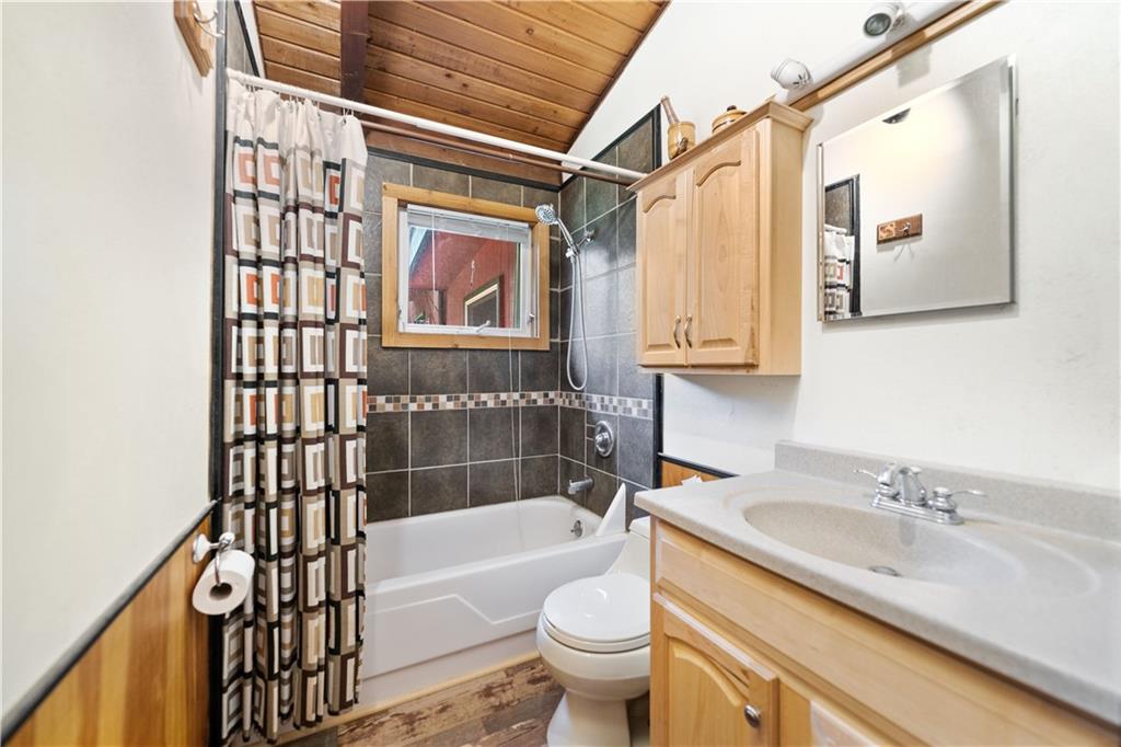 67 Spruce Peak Road Acme, PA 15610 - Photo 28 of 38 a bathroom with a sink a toilet and shower