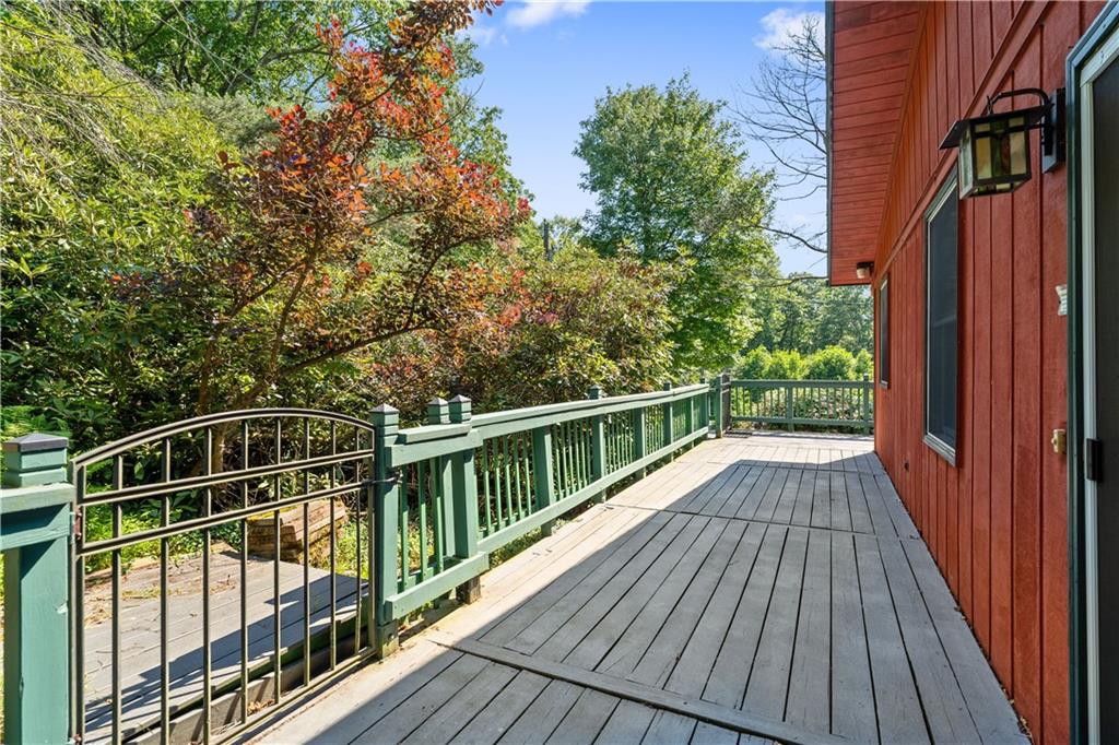 67 Spruce Peak Road Acme, PA 15610 - Photo 31 of 38 a view of balcony with wooden floor and fence
