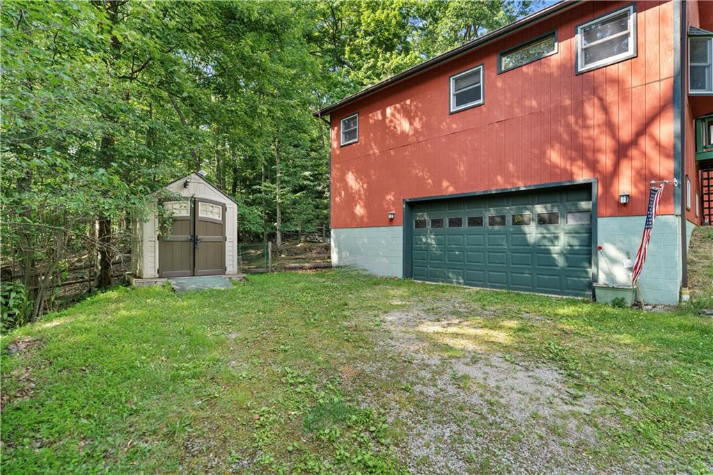 67 Spruce Peak Road Acme, PA 15610 - Photo 35 of 38 a view of a house with a yard