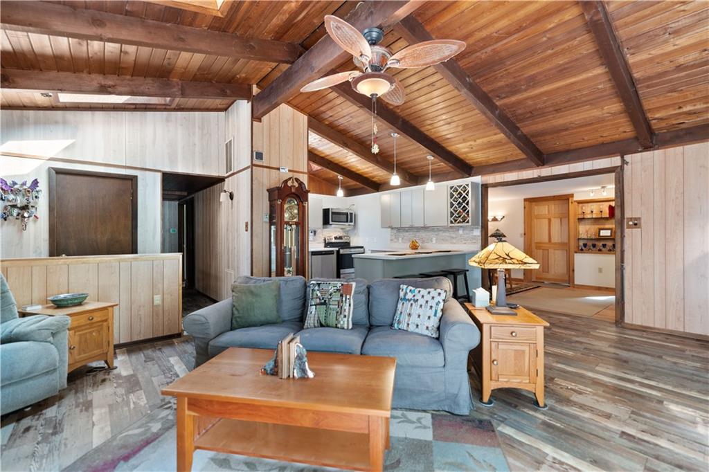 67 Spruce Peak Road Acme, PA 15610 - Photo 6 of 38 a living room with furniture and wooden floors