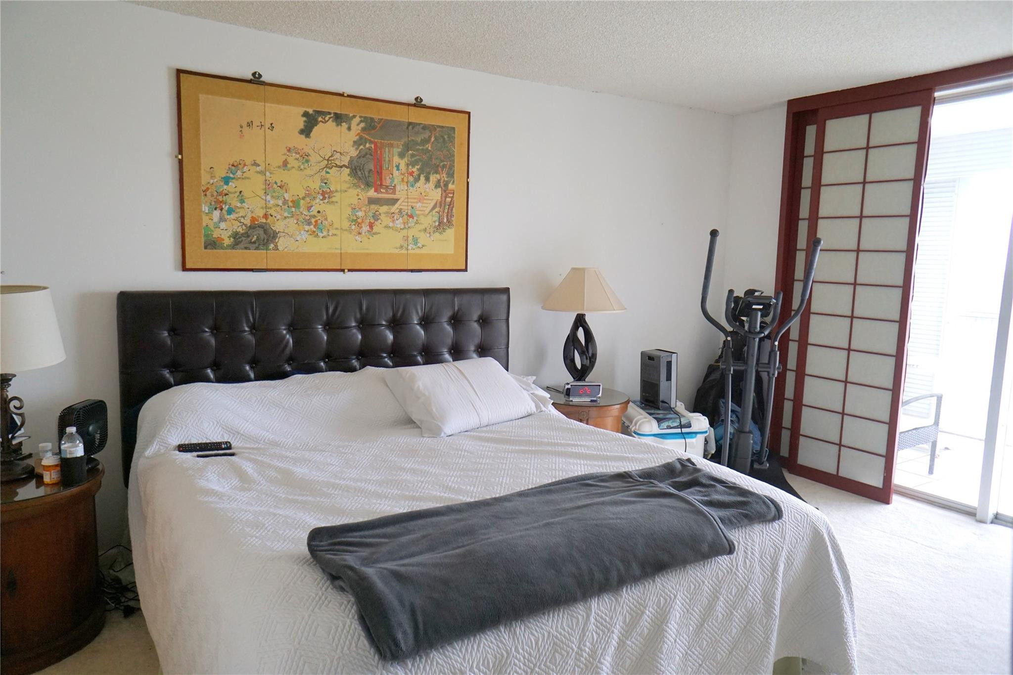 303 North Riverside Drive, Unit PH4 Pompano Beach, FL 33062 - Photo 18 of 52 a bedroom with a bed and a window