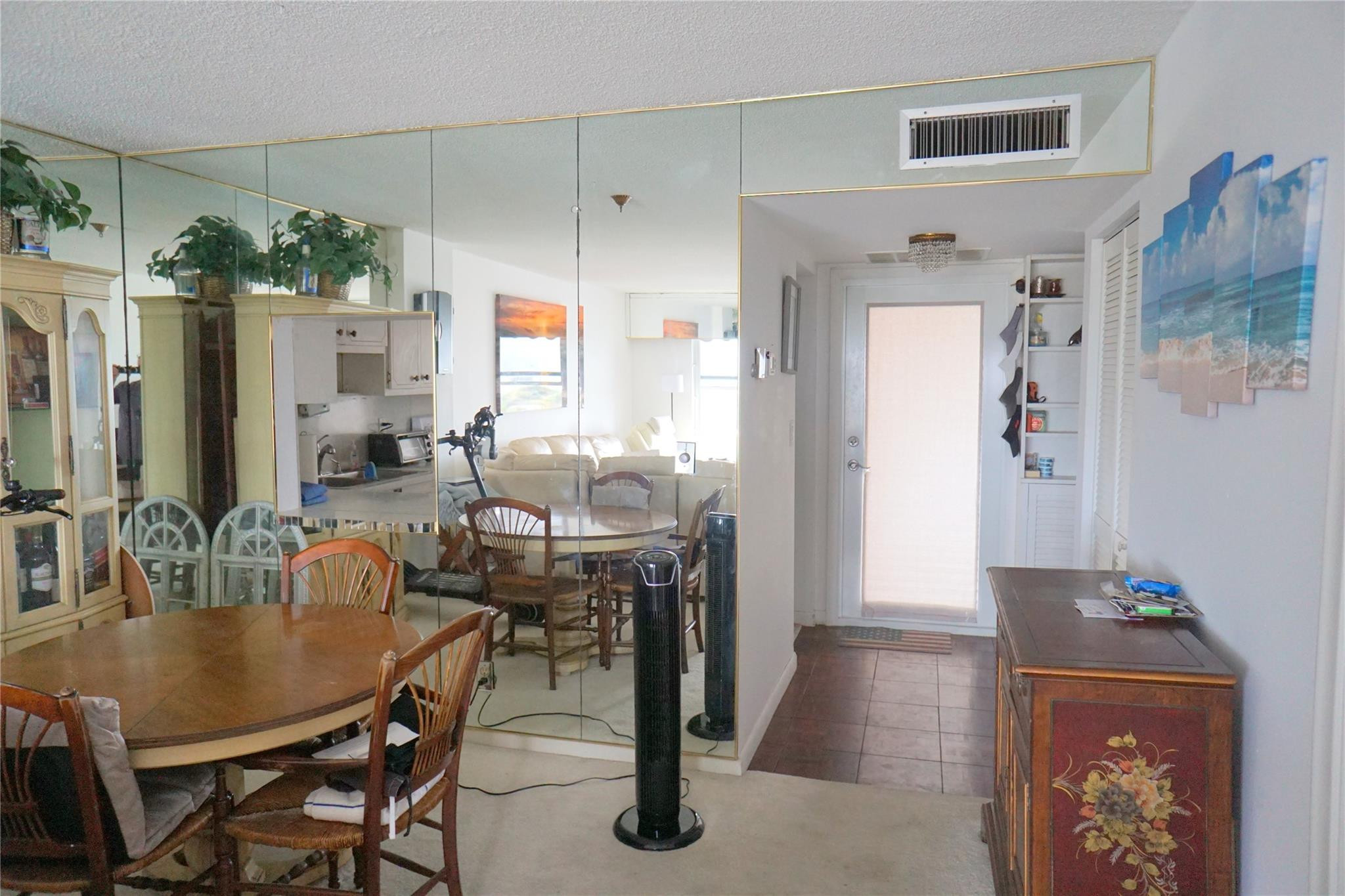 303 North Riverside Drive, Unit PH4 Pompano Beach, FL 33062 - Photo 7 of 52 a dining room with furniture and window