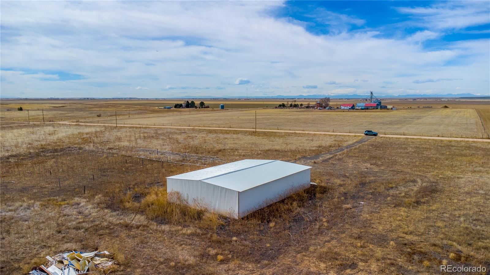 11300 Penrith Road Bennett, CO 80102 - Photo 2 of 9 a view of ocean with water fall