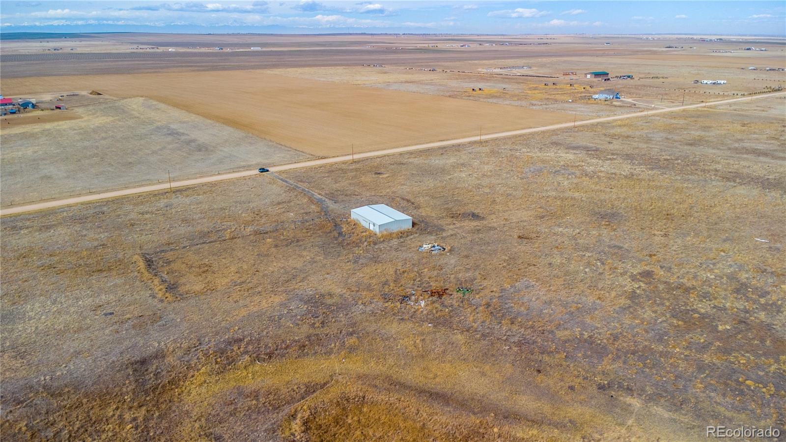 11300 Penrith Road Bennett, CO 80102 - Photo 4 of 9 a view of a room with an ocean beach