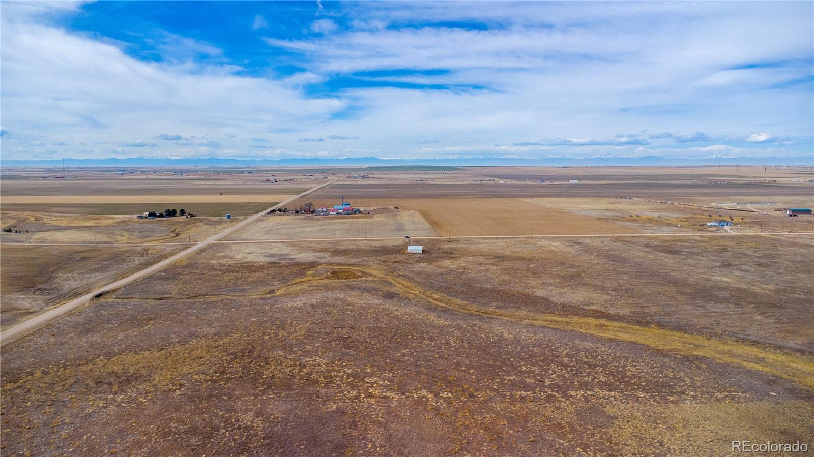 11300 Penrith Road Bennett, CO 80102 - Photo 8 of 9 a view of an ocean and beach