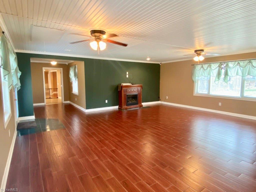 482 Nurse Road Ararat, NC 27007 - Photo 12 of 30 Main level Den with Gas Logs and mini-split for heat and air