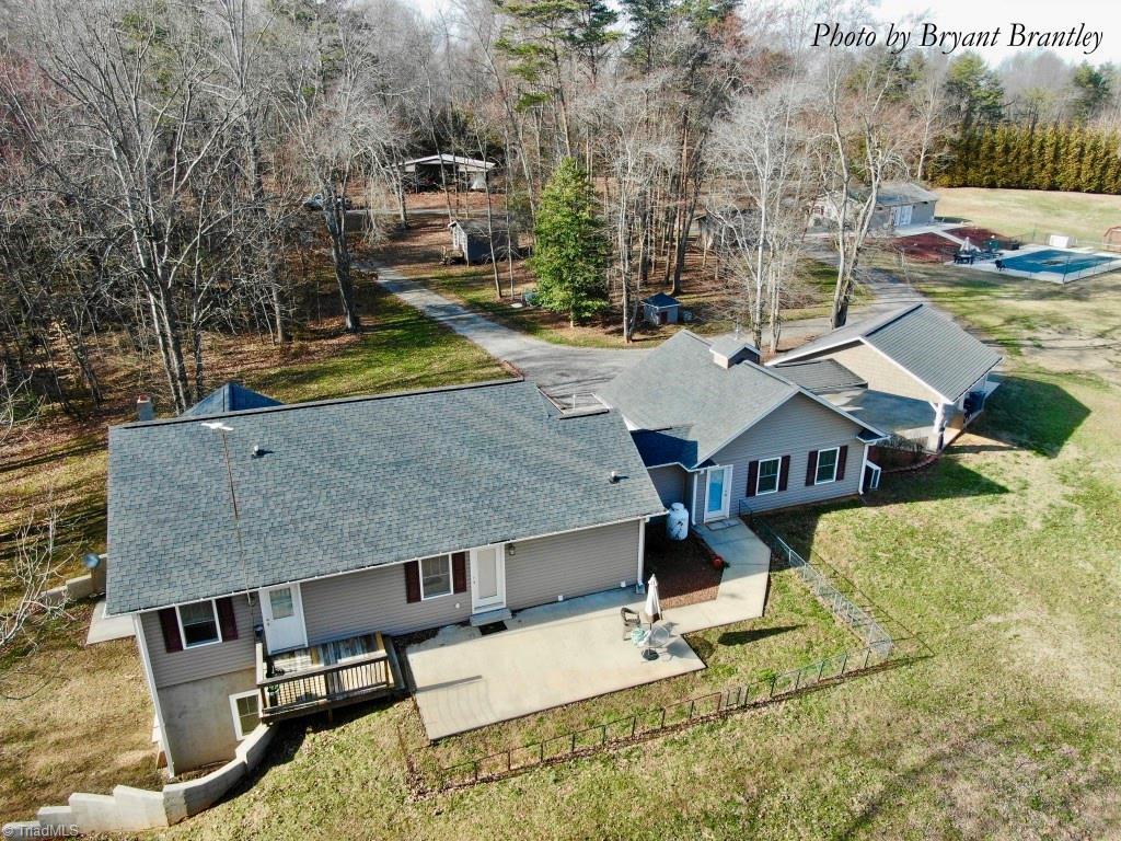 482 Nurse Road Ararat, NC 27007 - Photo 6 of 30 Rear patio and small fenced area for your pets