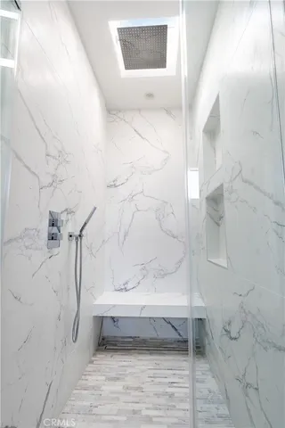 a building exterior with furniture