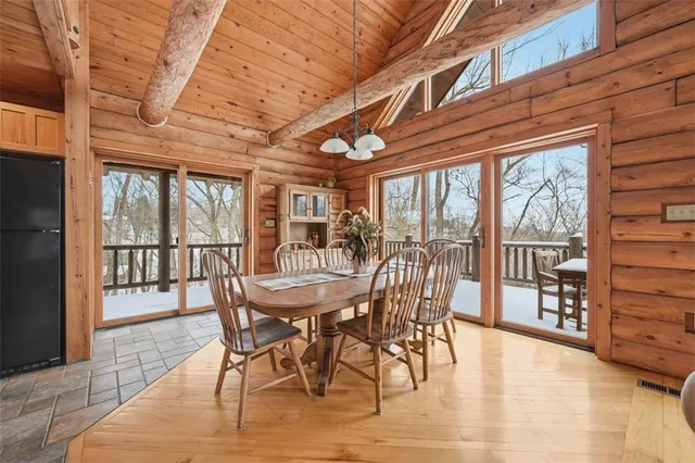 a dining room with furniture window wooden floor