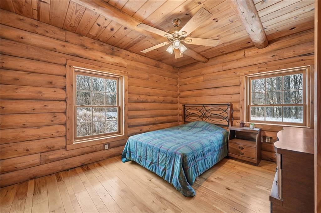 70 Economy Grade Road Coraopolis, PA 15108 - Photo 21 of 45 a bedroom with a bed and wooden floor