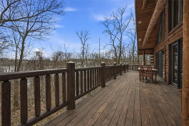 a view of balcony with wooden floor