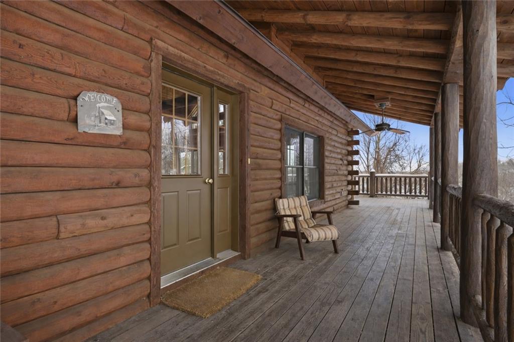 70 Economy Grade Road Coraopolis, PA 15108 - Photo 4 of 45 a view of a balcony with chairs and wooden floor