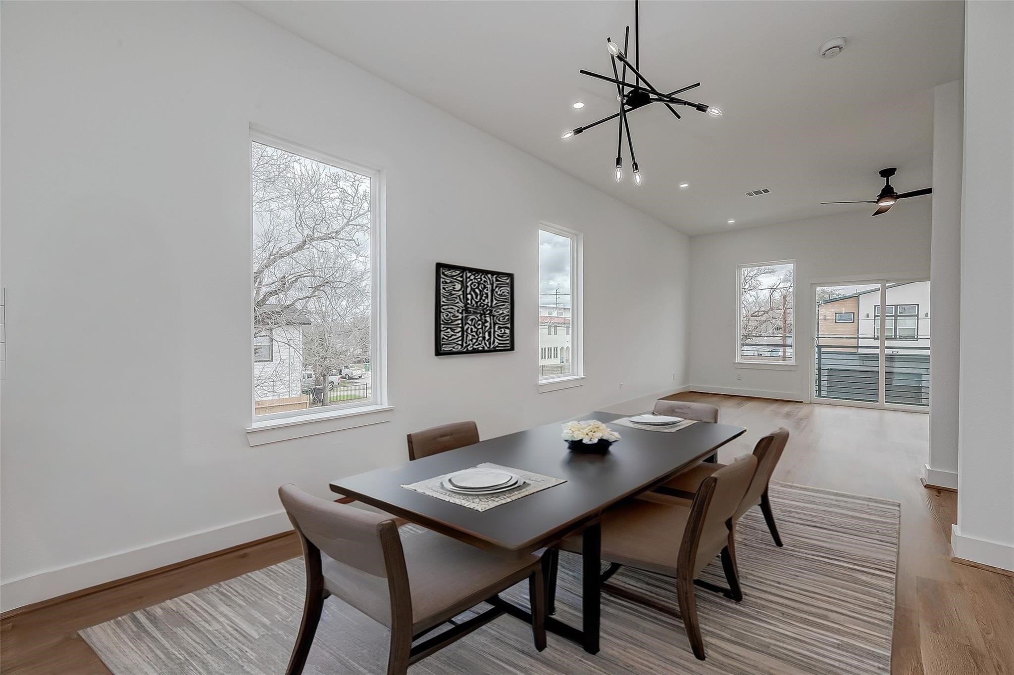 3624 Goodhope Street Houston, TX 77021 - Photo 12 of 32 a view of a dining room with furniture window and wooden floor