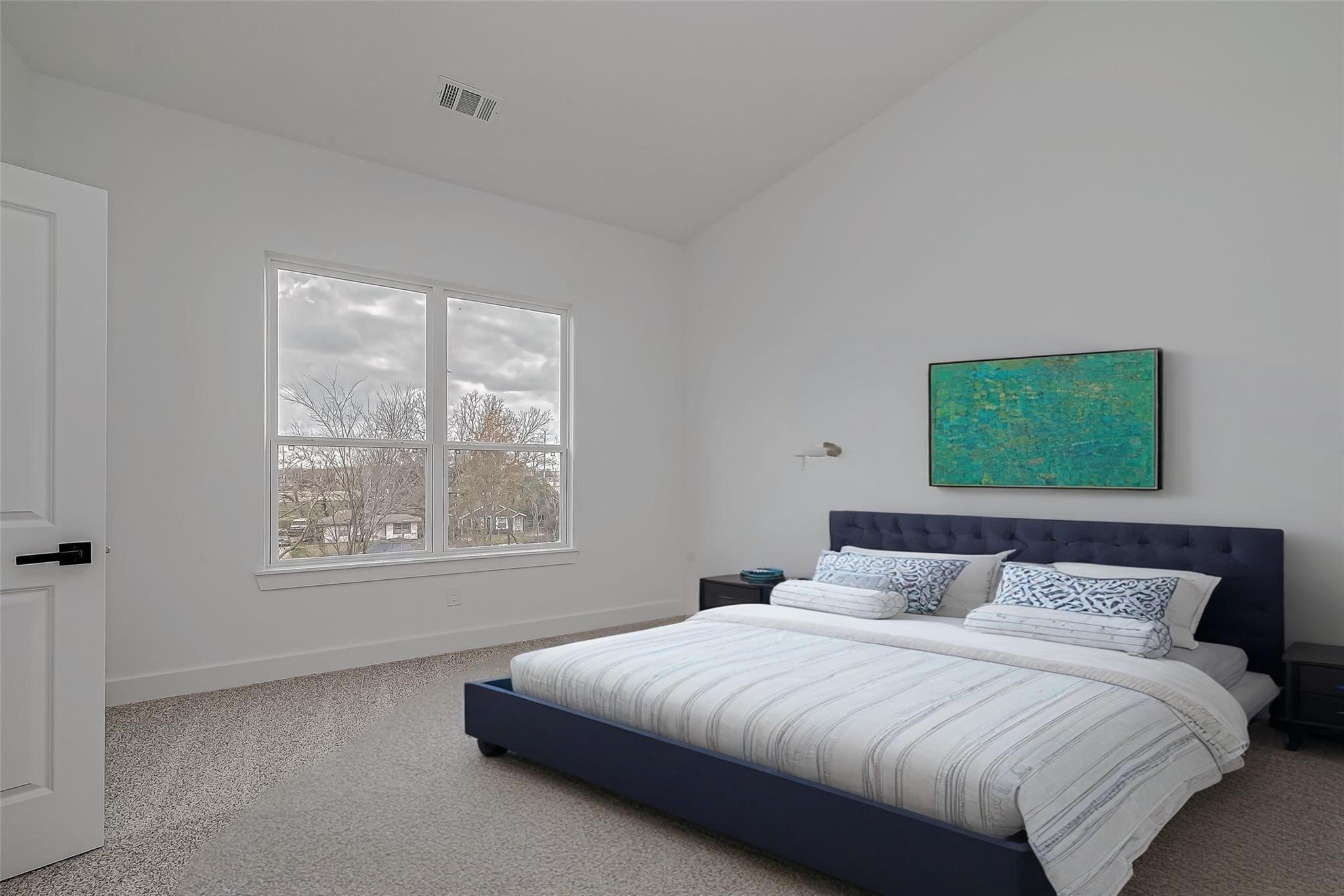 3624 Goodhope Street Houston, TX 77021 - Photo 26 of 32 a bedroom with a bed and a window
