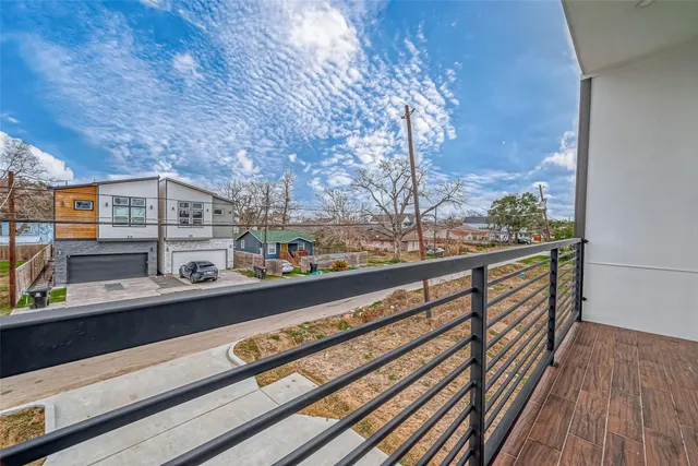 a view of city from a balcony