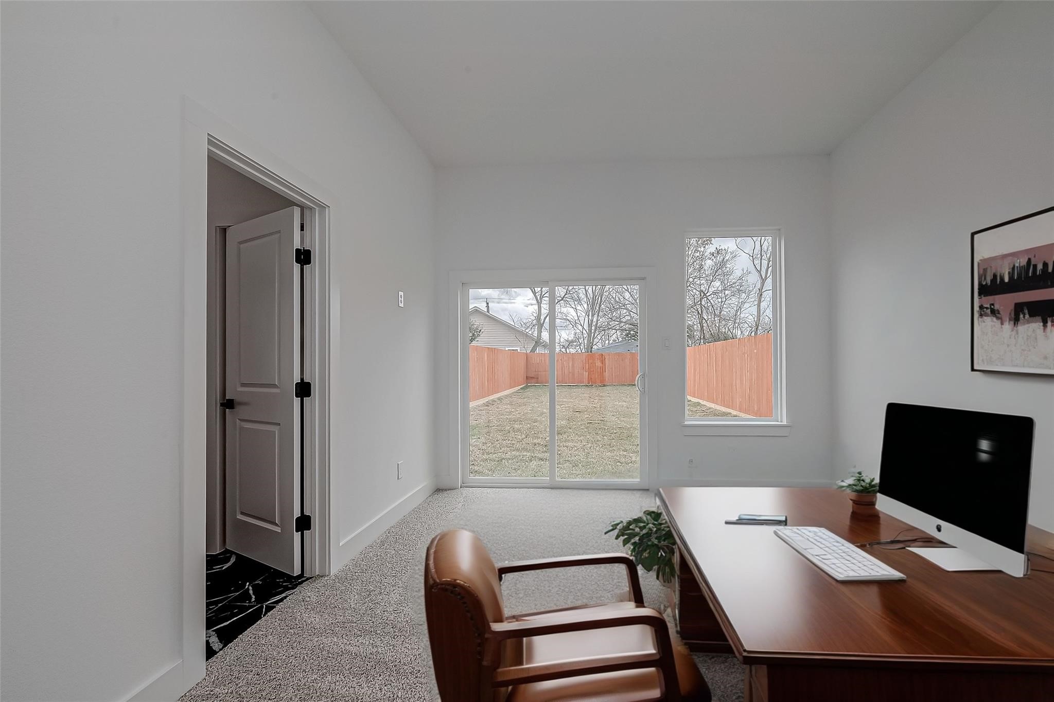 3624 Goodhope Street Houston, TX 77021 - Photo 4 of 32 a view of a workspace with furniture and a window