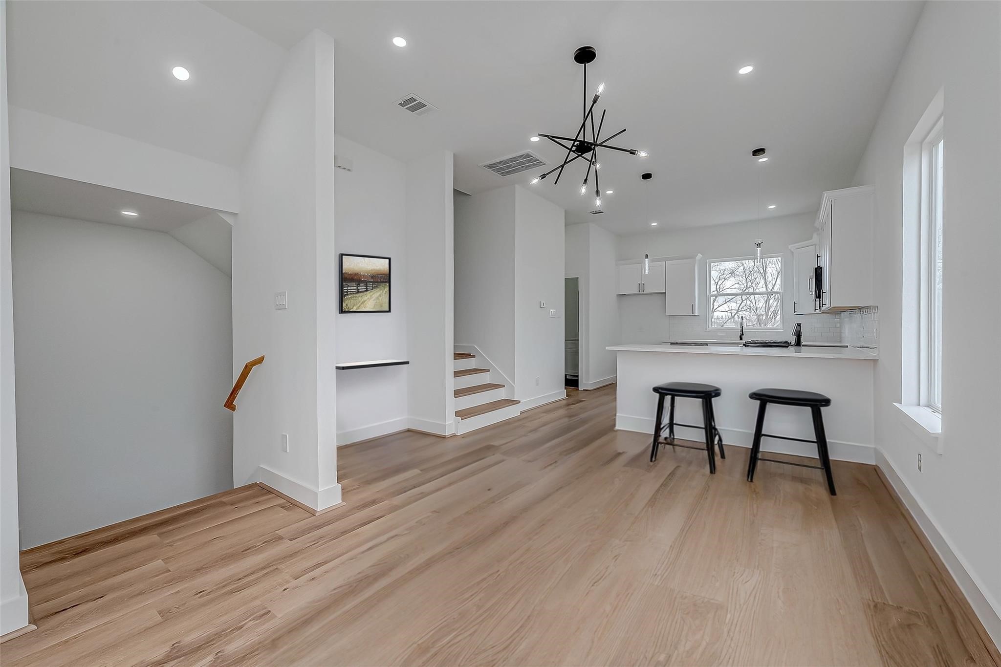 3624 Goodhope Street Houston, TX 77021 - Photo 8 of 32 a view of a kitchen with a table and chairs