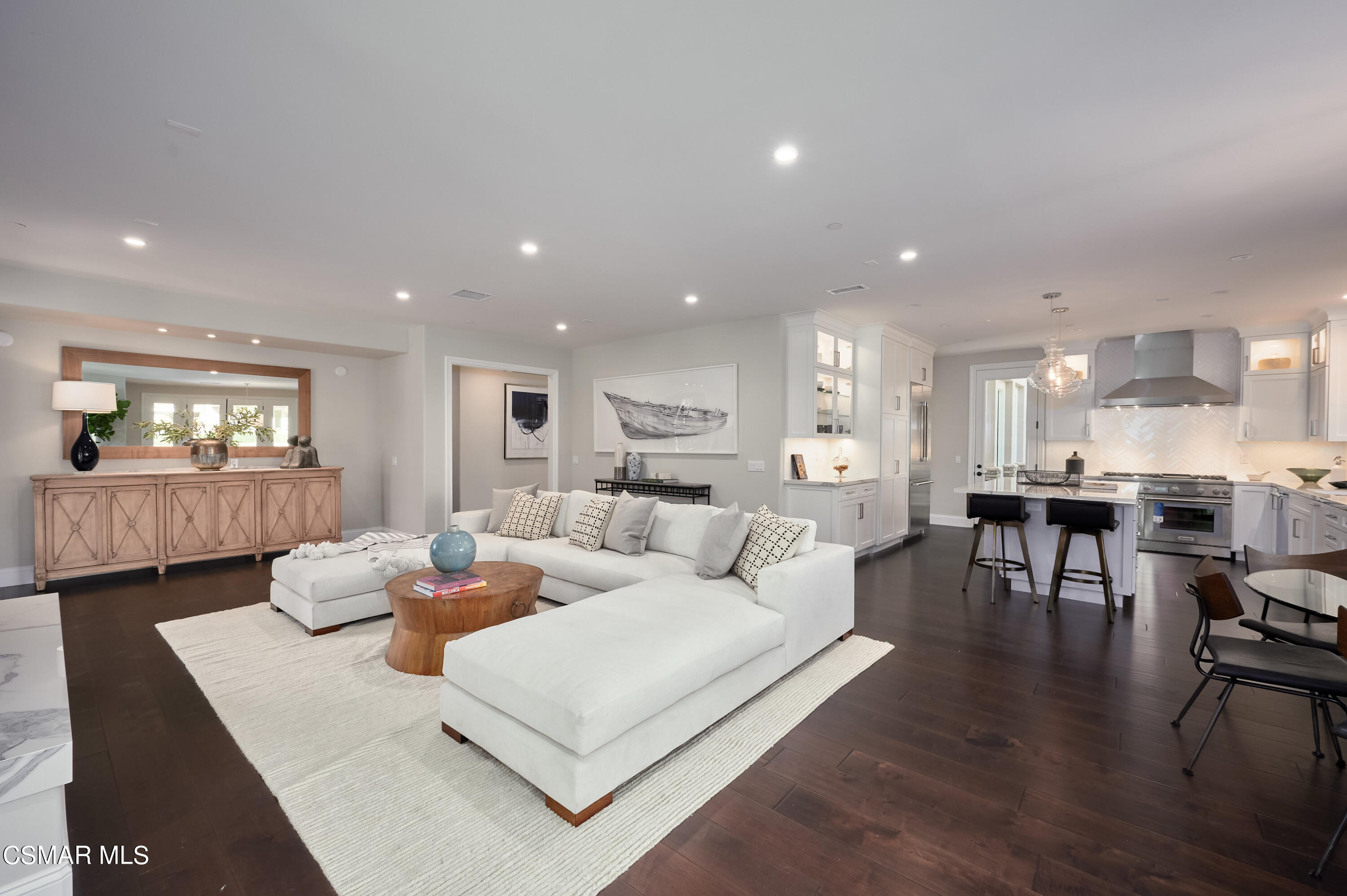 2020 Upper Ranch Road Westlake Village, CA 91362 - Photo 22 of 72 a living room with furniture kitchen view and a wooden floor