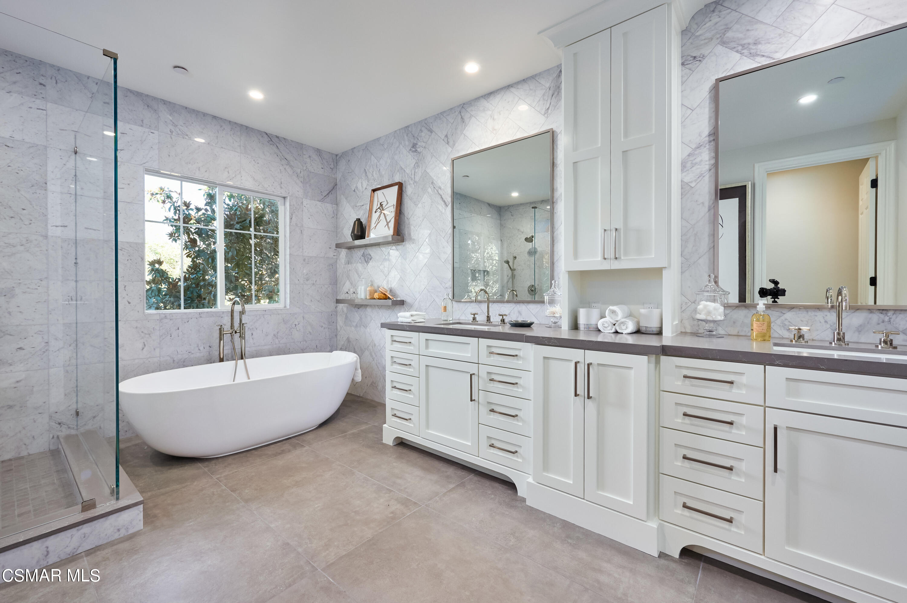 2020 Upper Ranch Road Westlake Village, CA 91362 - Photo 40 of 72 a spacious bathroom with a double vanity sink large mirror and bathtub