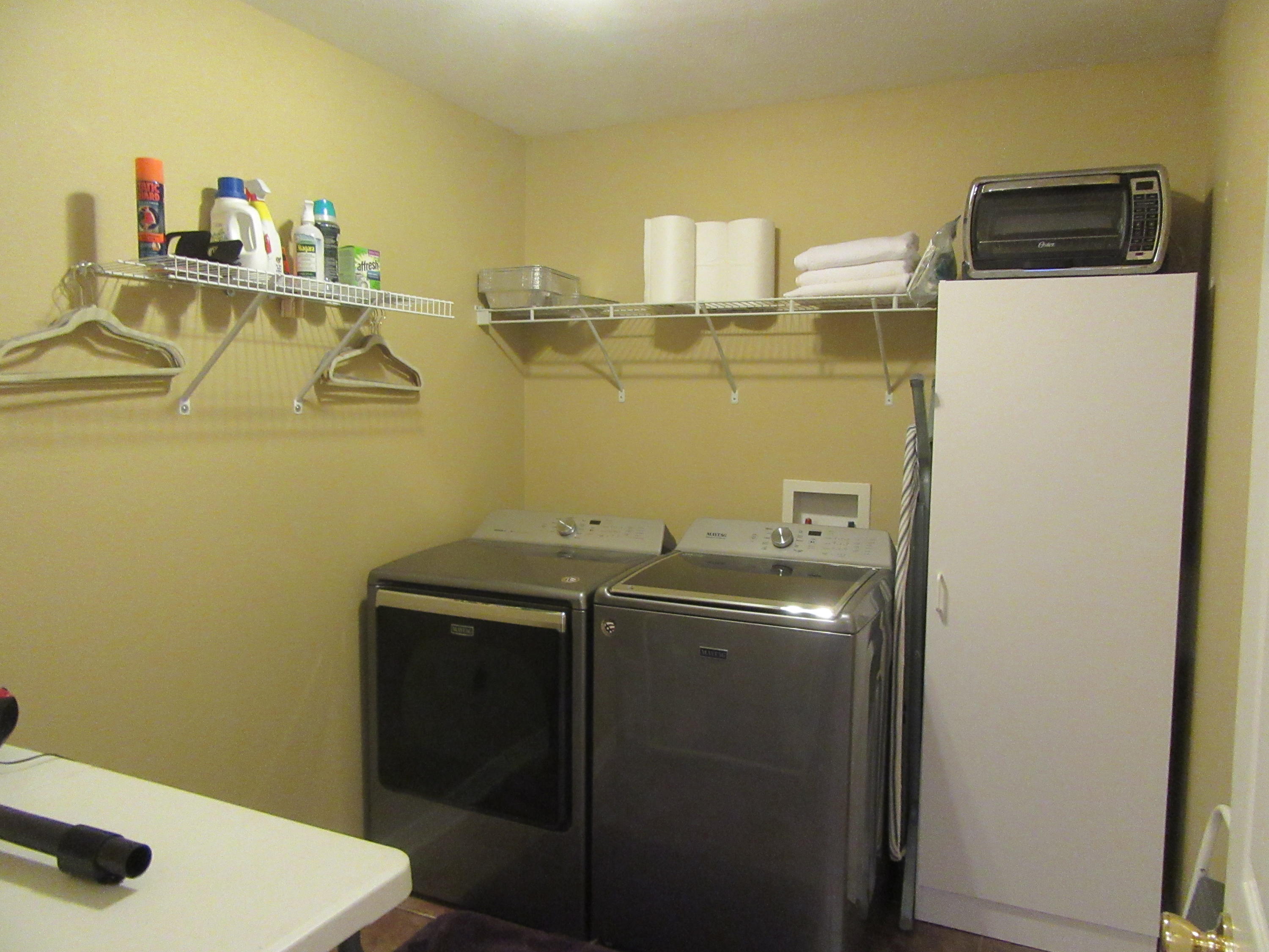 5968 Buckward Road Baker, FL 32531 - Photo 19 of 52 a utility room with dryer and washer
