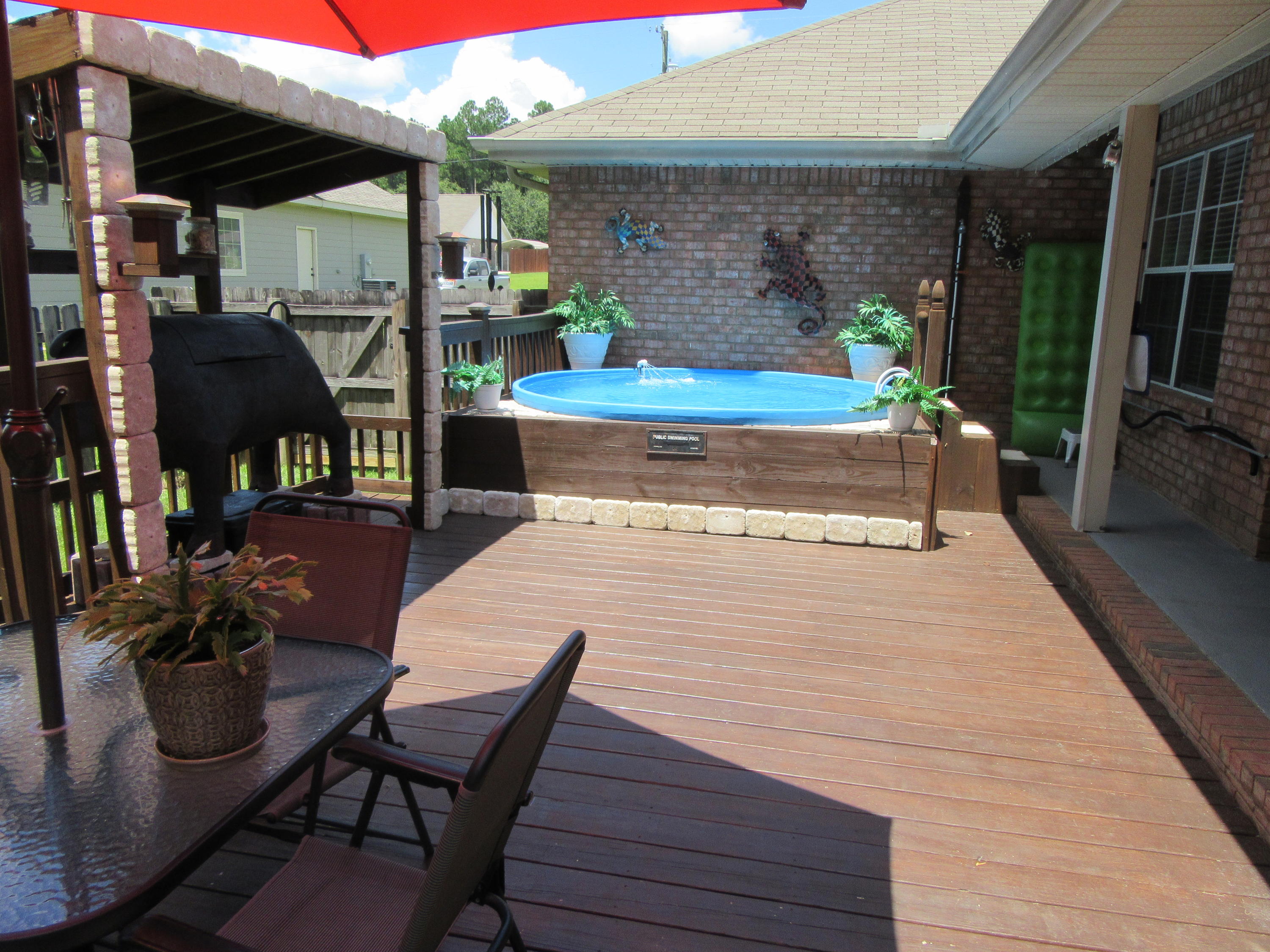 5968 Buckward Road Baker, FL 32531 - Photo 38 of 52 a outdoor space with lots of table and chairs