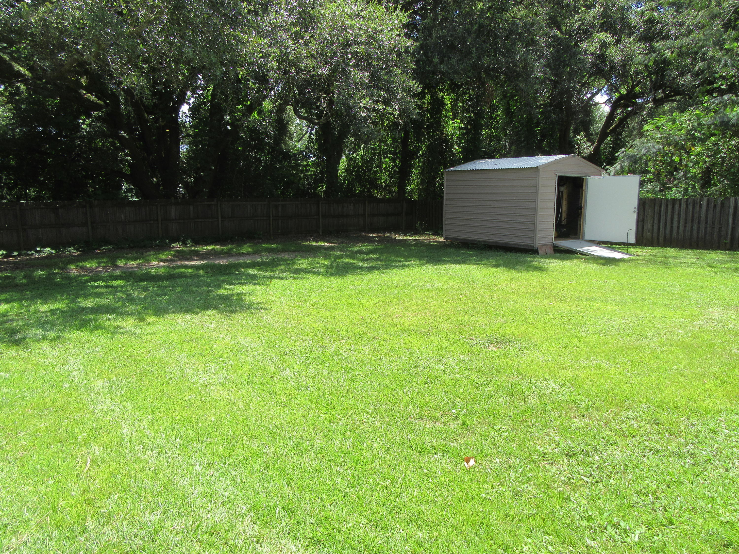 5968 Buckward Road Baker, FL 32531 - Photo 50 of 52 a view of a backyard
