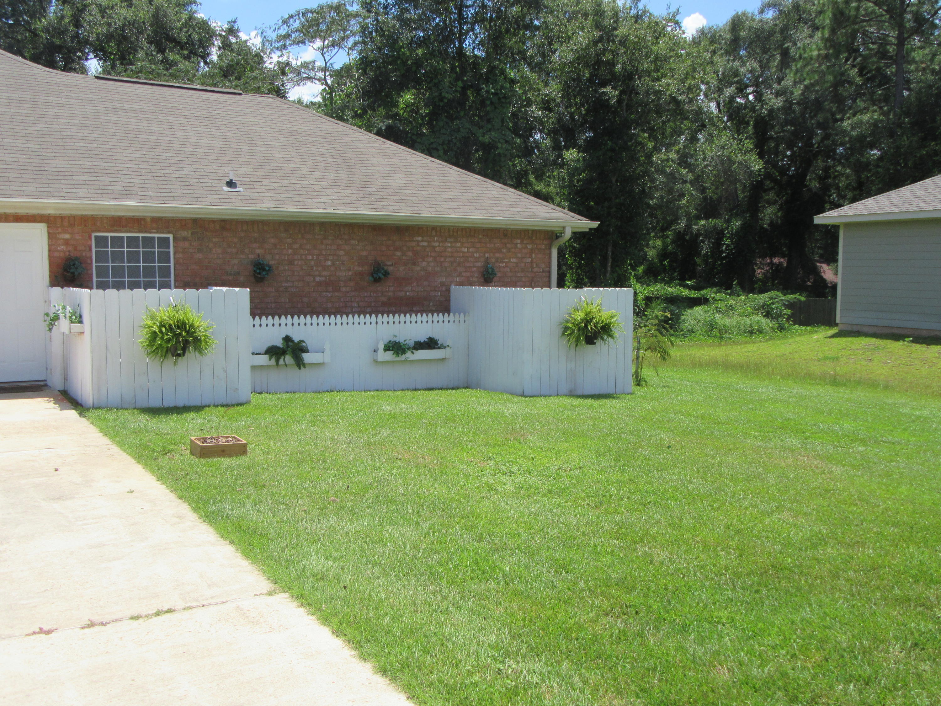 5968 Buckward Road Baker, FL 32531 - Photo 6 of 52 front view of house with a yard