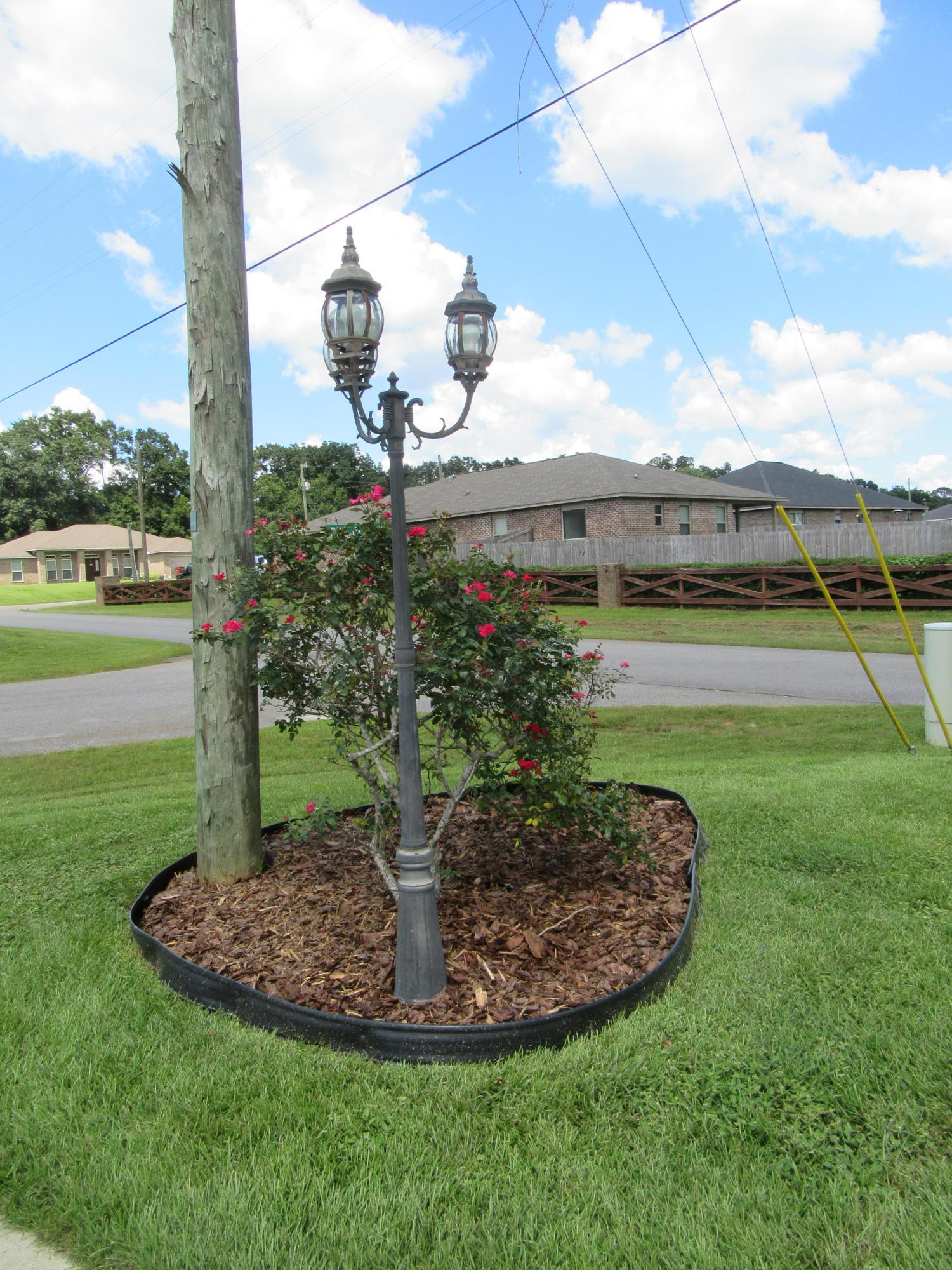 5968 Buckward Road Baker, FL 32531 - Photo 52 of 52 a view of a backyard