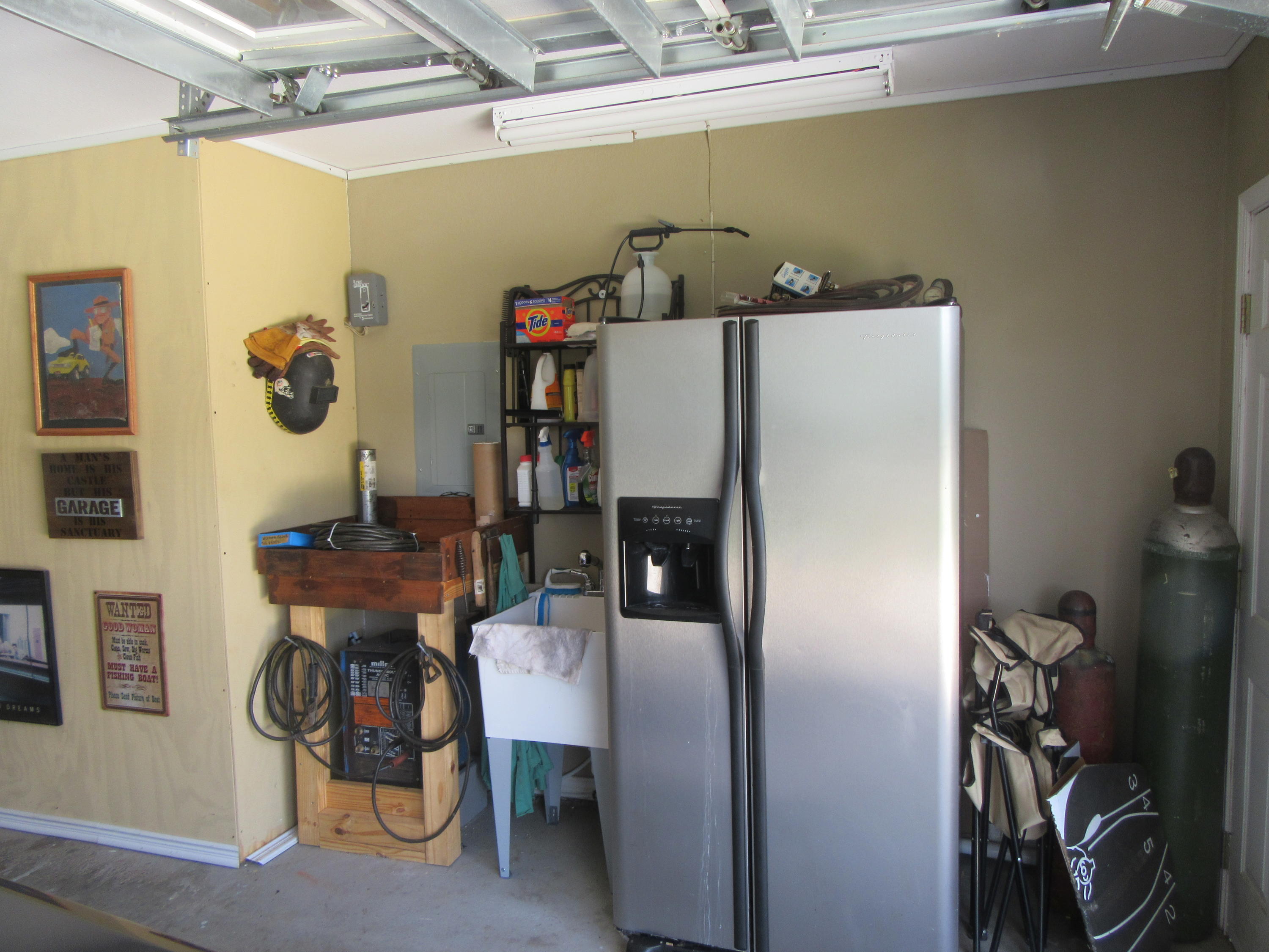 5968 Buckward Road Baker, FL 32531 - Photo 9 of 52 a room with storage and utility room