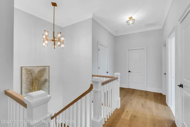 a front view of a residential apartment building with a yard